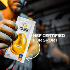 YOLKED pouch in a gym bag highlighting portable supplementation.