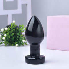 YOUNAIERZX polished obsidian surface highlights deep black luster for display.