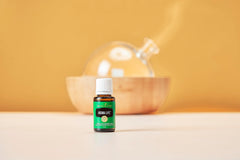 Aroma Life diffuser setup by Young Living in a serene home ambiance.