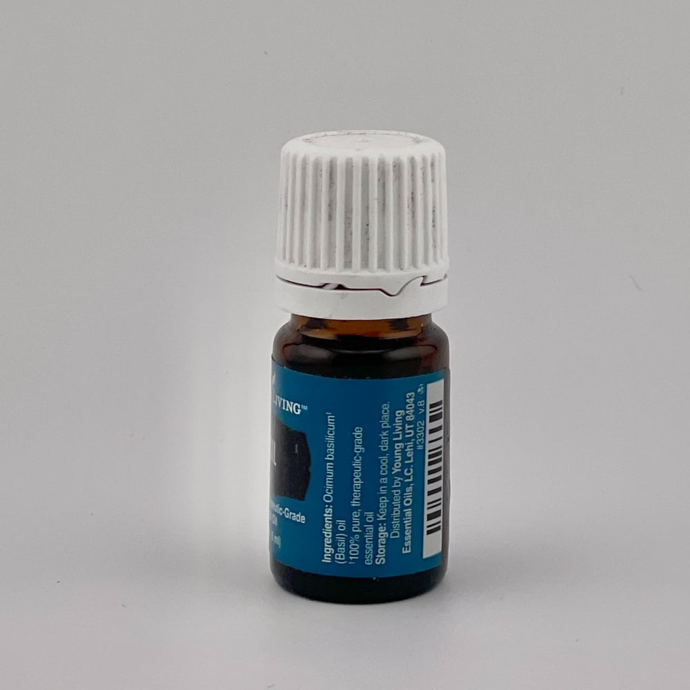 Young Living Basil Essential Oil used to flavor cooking with herbal notes.