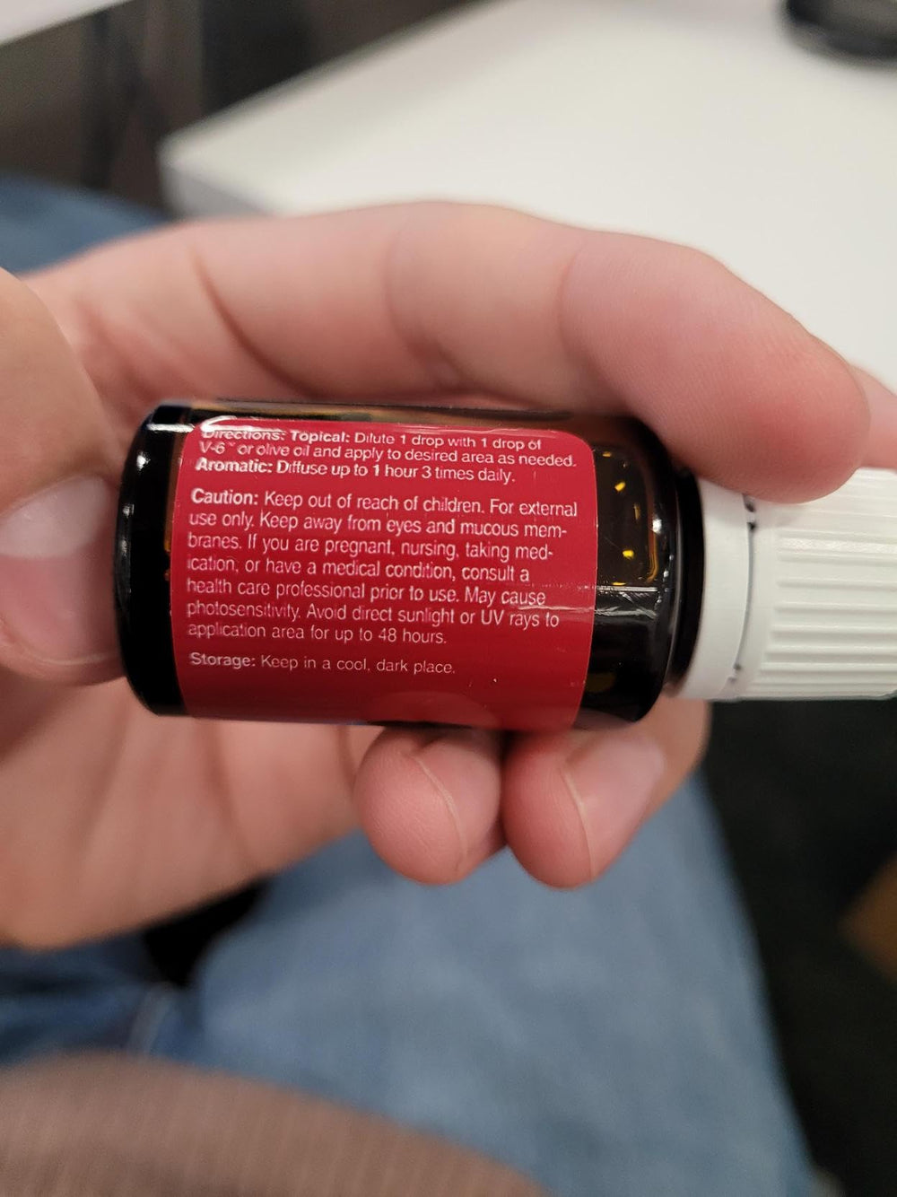 Young Living Bergamot Oil label close-up emphasizes Seed to Seal quality.