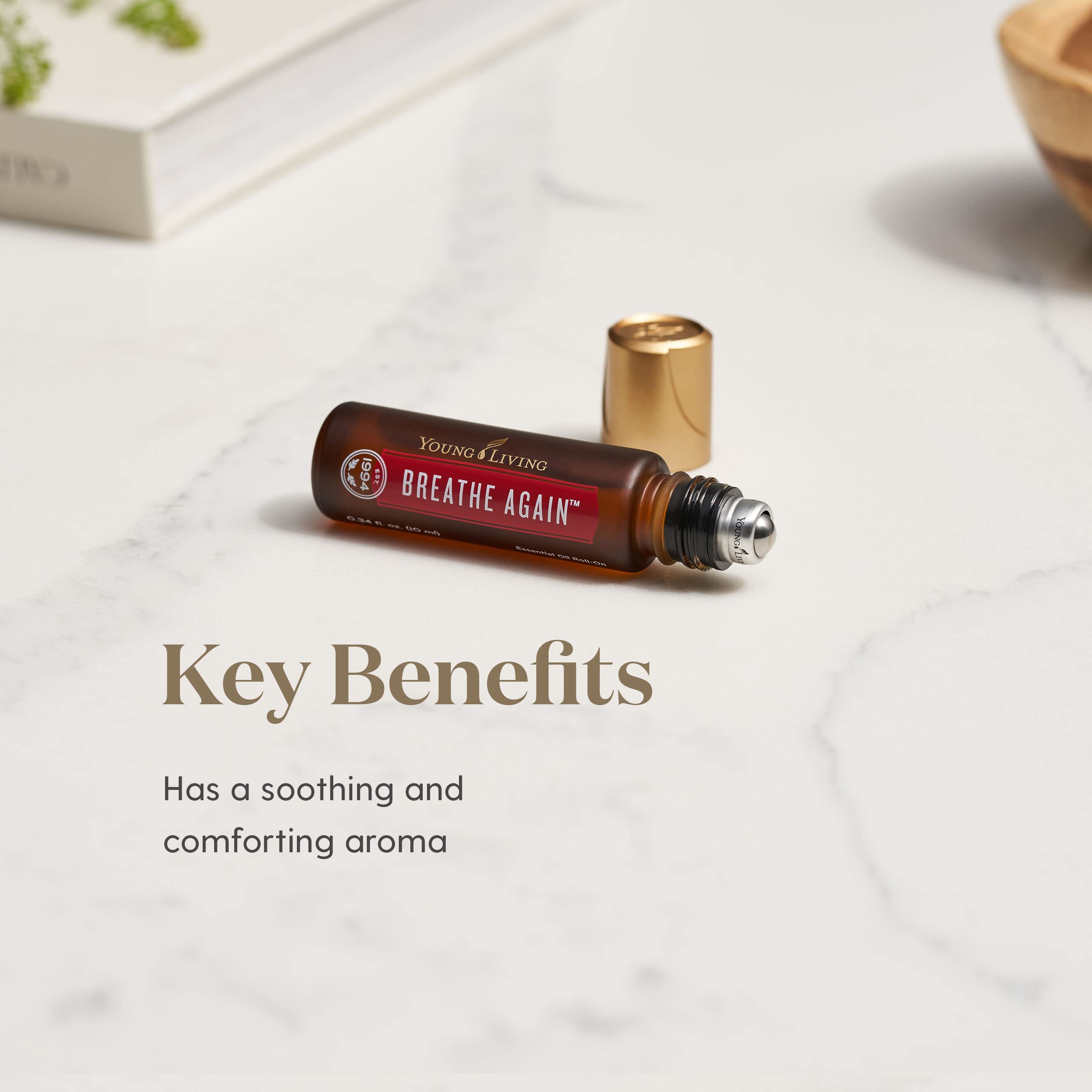 Young Living Breathe Again bottle with eucalyptus leaves to show natural blend