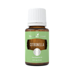 Young Living Citronella essential oil bottle on table for outdoor freshness.