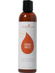 Young Living Copaiba Vanilla Moisturizing Conditioner bottle for hydrated, silky hair.