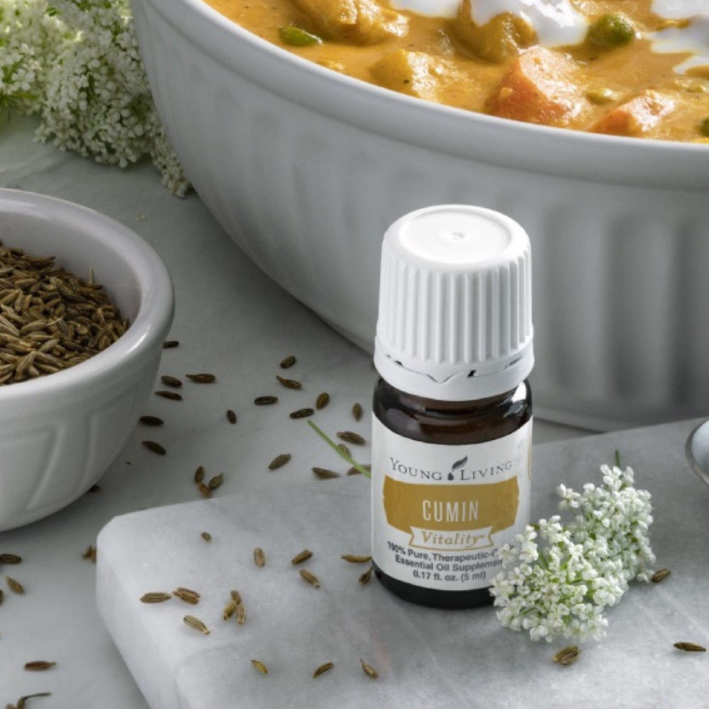Young Living Cumin Vitality cumin seeds ready for aromatic seasoning.