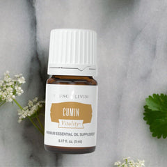 Young Living Cumin Vitality dropper dispensing oil for easy culinary use.
