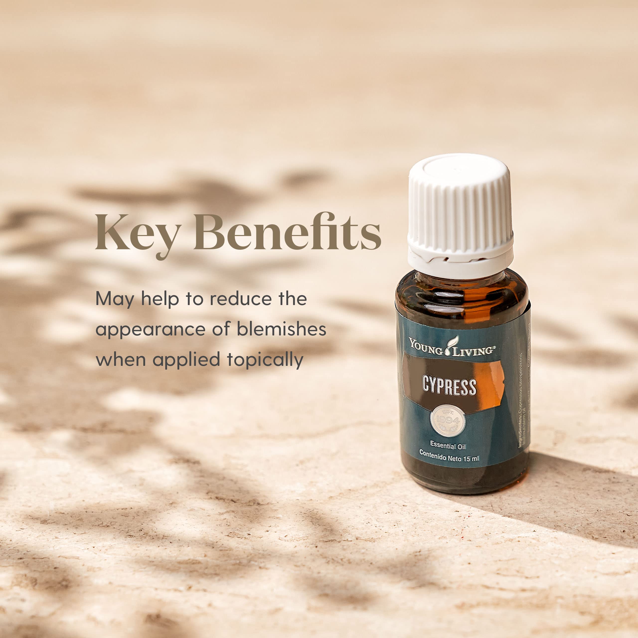 Cypress oil on skin with carrier oil for gentle refresh and moisturization.