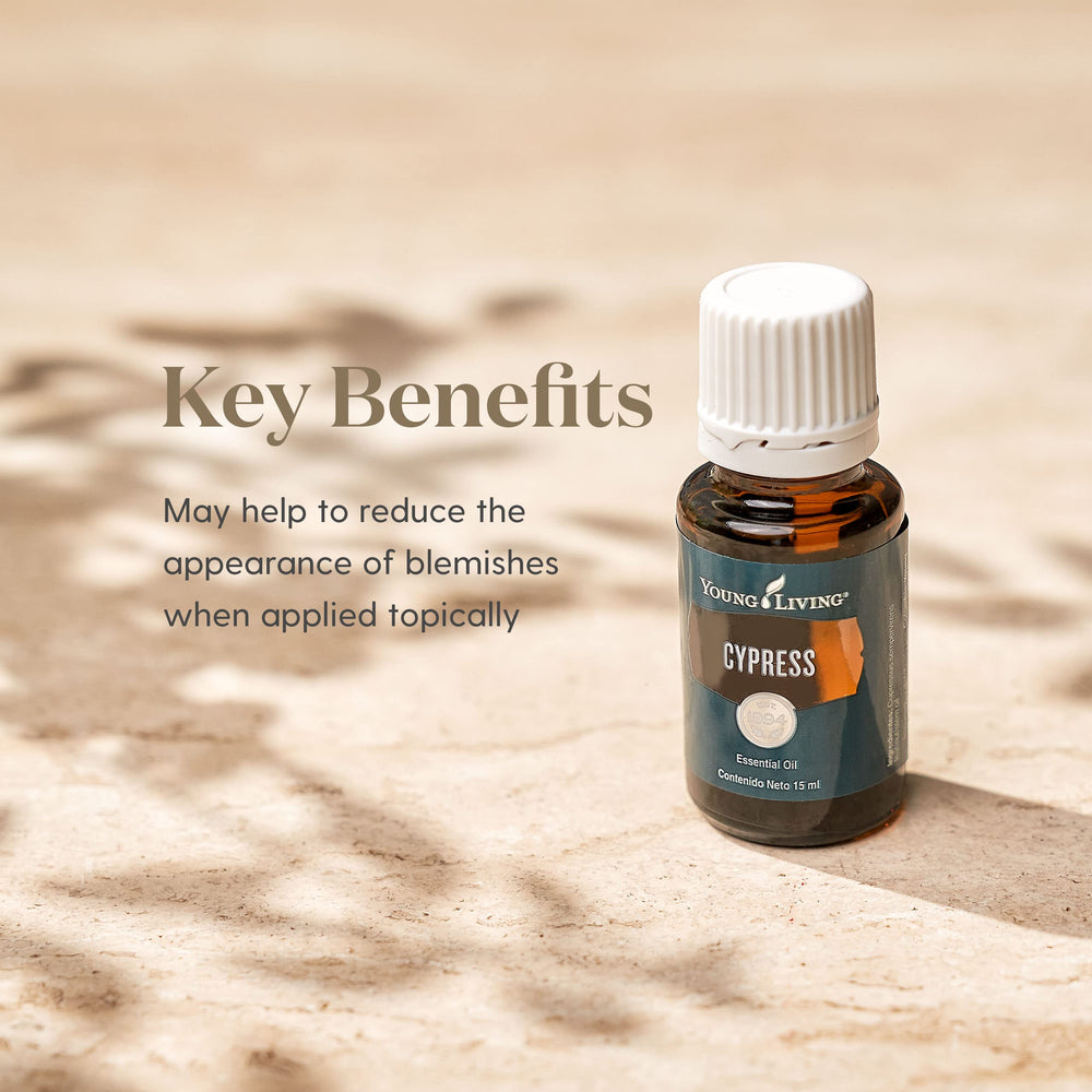 Cypress oil on skin with carrier oil for gentle refresh and moisturization.