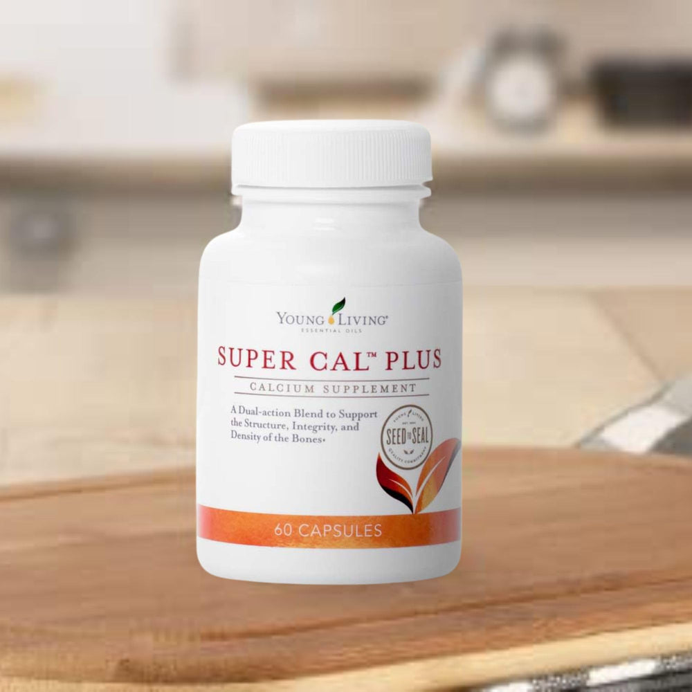 Daily wellness setup with Super Cal Plus beside a glass of water.