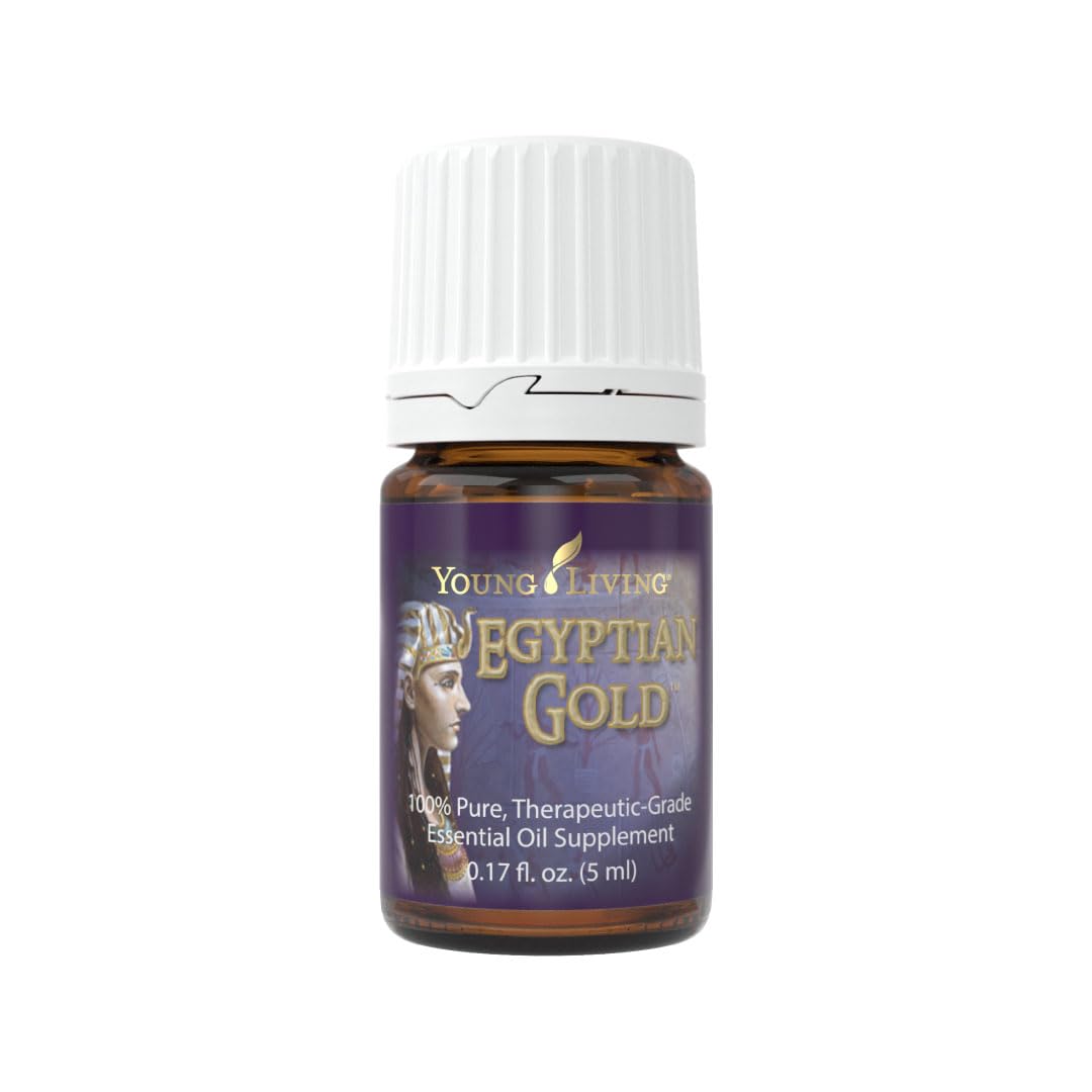 Young Living Egyptian Gold bottle with devotional aroma enhances meditation ambiance.