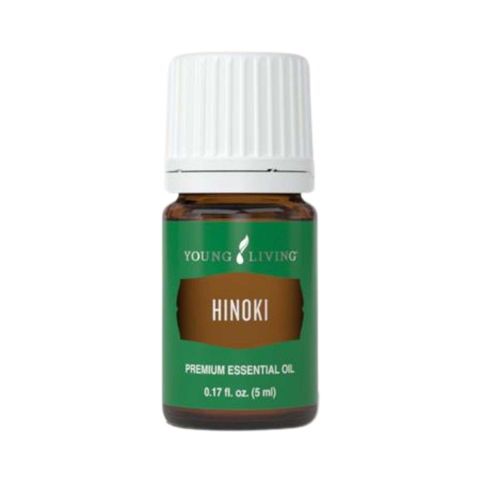 Young Living Hinoki essential oil bottle diffusing for a refreshing ambience.