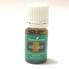 Young Living Jade Lemon essential oil bottle pour for an uplifting aroma.