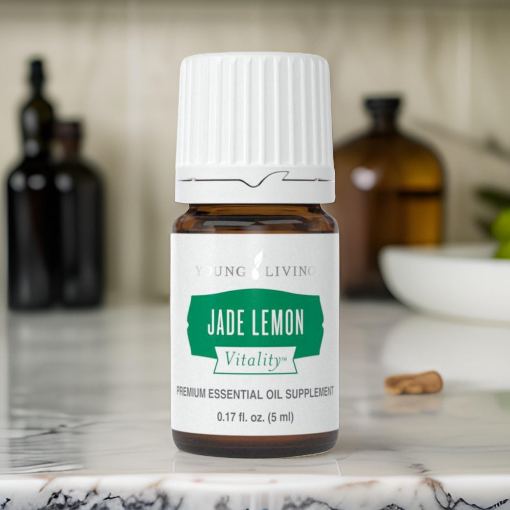 Young Living Jade Lemon Vitality bottle in a refreshing drink