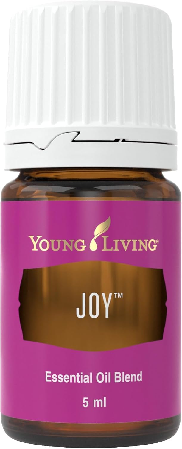 Young Living Joy bottle pour highlights its floral aroma for an inviting scent.