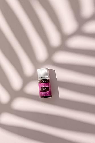 Young Living Joy rose-petal-note showcases soft floral accents for serenity.