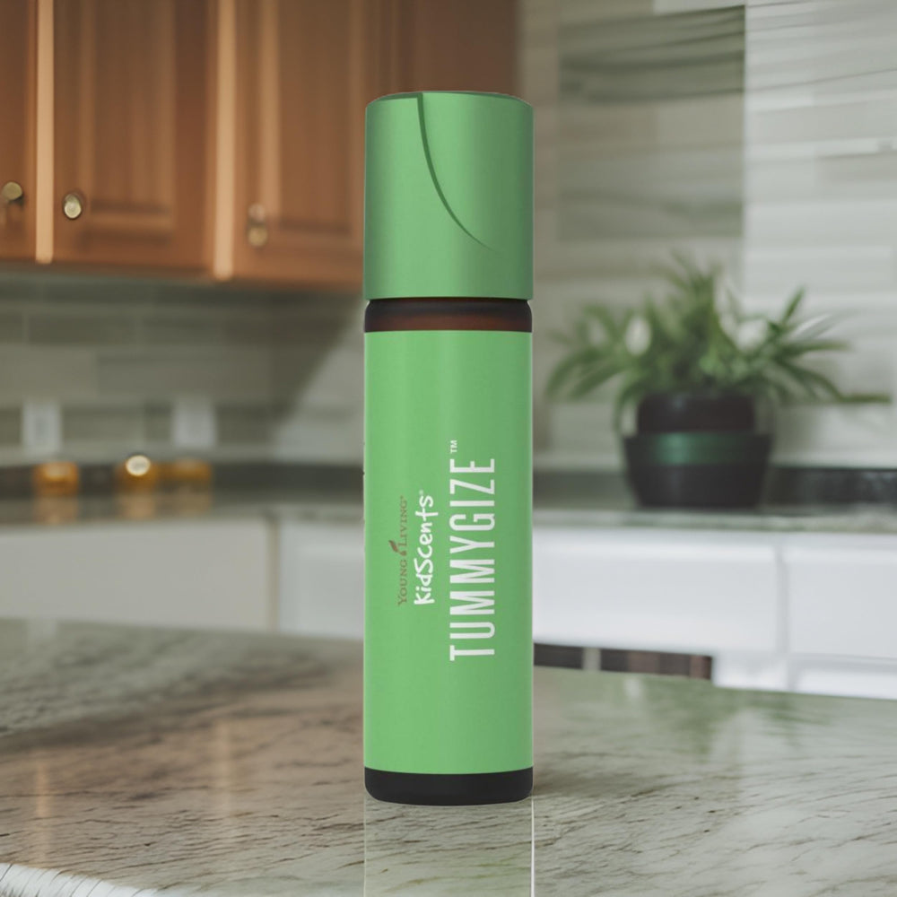 TummyGize roll-on being dispensed onto the palm for easy use