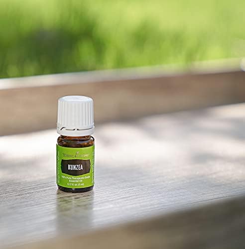 Young Living Kunzea essential oil skin application demonstration.