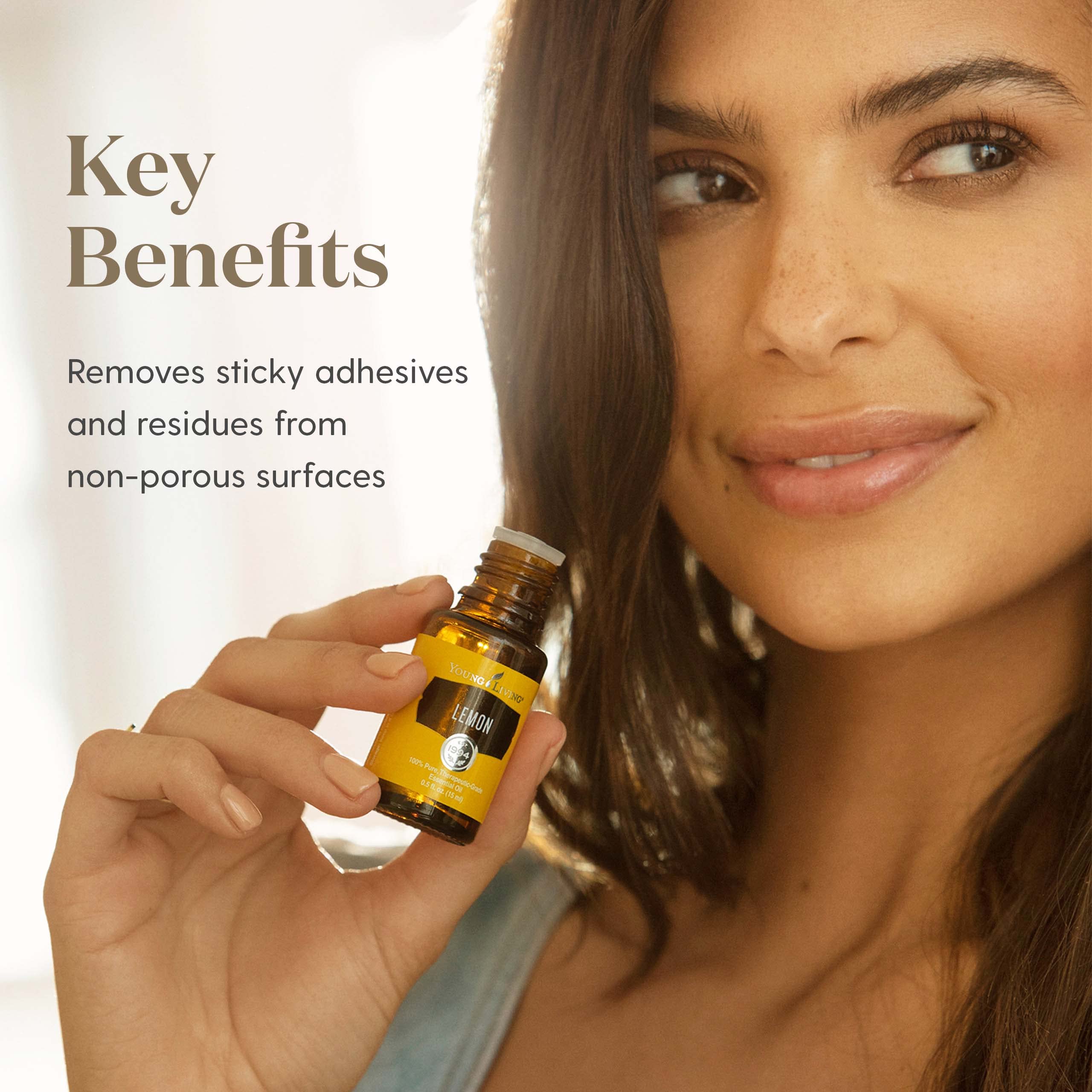 Travel-size Young Living Lemon Oil 15ml bottle for on-the-go refreshment.