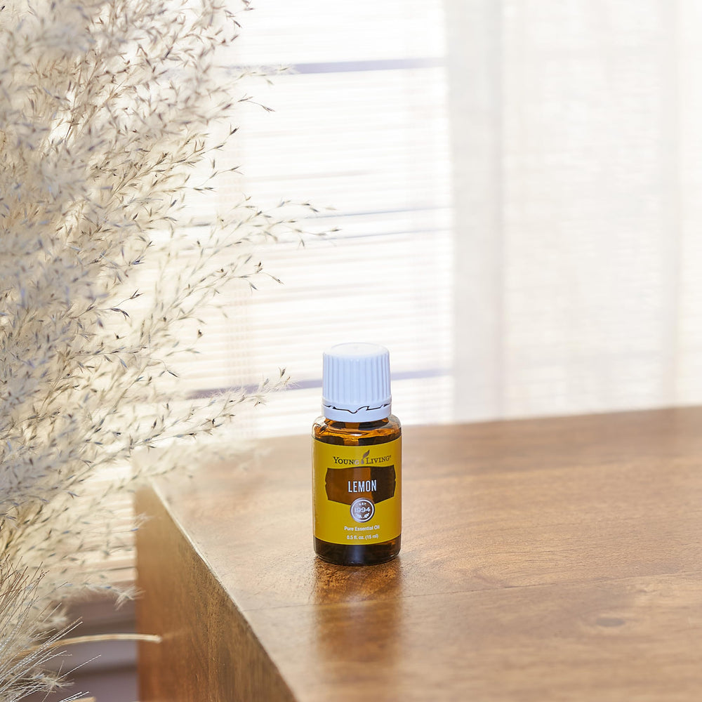 Young Living Lemon pour shows easy application for diffusers and blends.