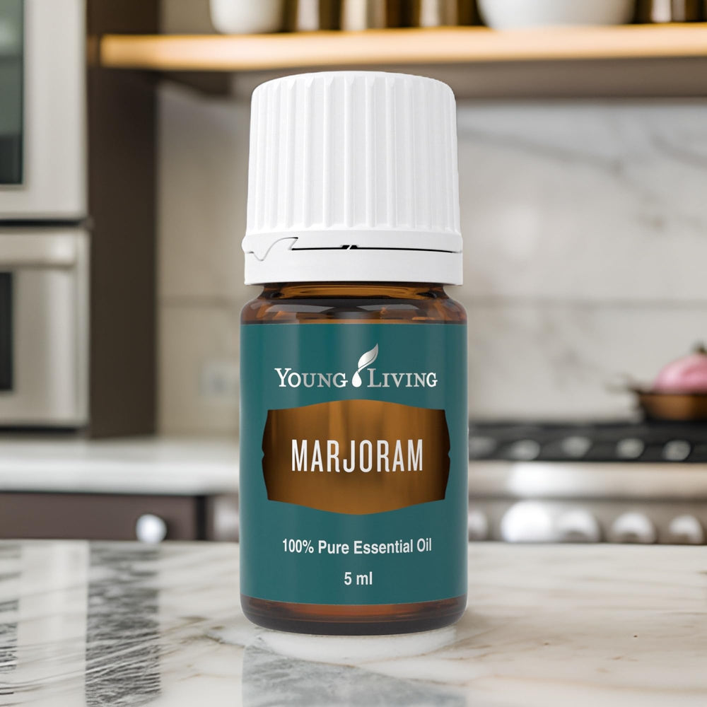 Dilution glass with Young Living Marjoram oil for safe topical use