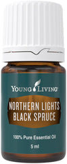 Young Living Northern Black Spruce bottle close-up showing a fresh, uplifting aroma.