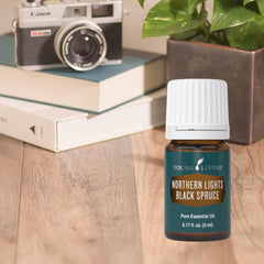  diffuser scene with Young Living Northern Black Spruce for calming ambiance