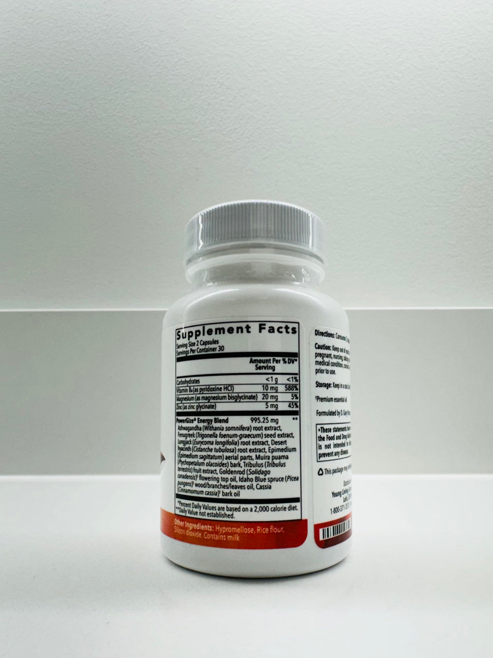 PowerGize capsules with a stopwatch showing workout timing.