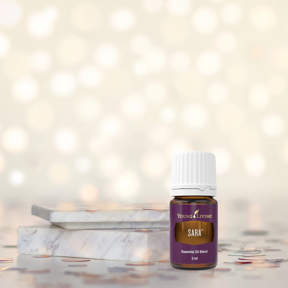 Young Living SARA essential oil during yoga enhances mindful practice.