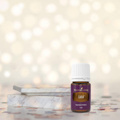 Young Living SARA essential oil during yoga enhances mindful practice.