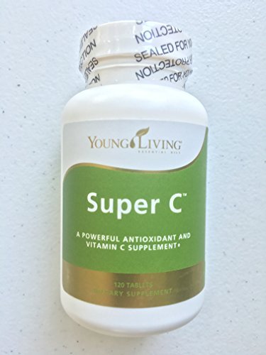 Young Living Super C Tablets bottle close-up, suggesting daily vitamin C for overall wellness.