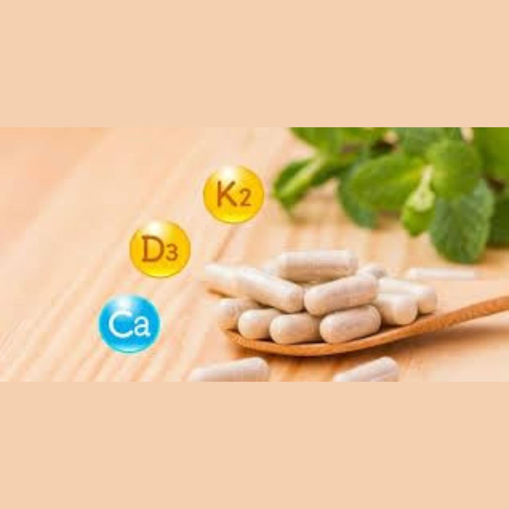 Young Living Super Cal Plus capsules on a bright surface for convenient daily supplementation.