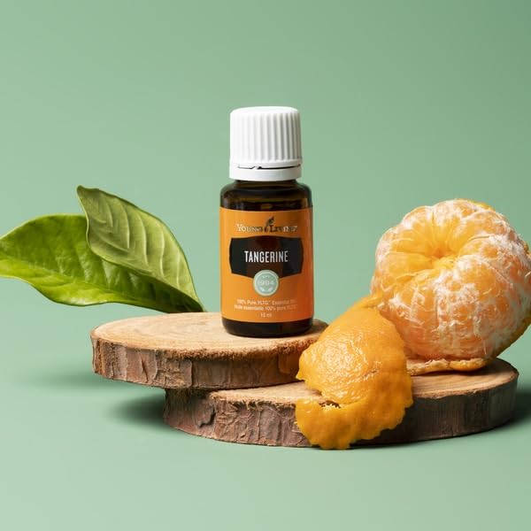 Young Living Tangerine oil dropper ready for precise use