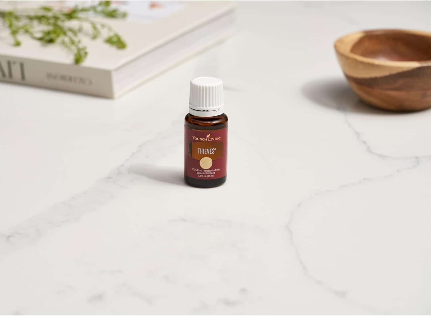 Young Living Thieves diffuser emits a bright, energizing room aroma.