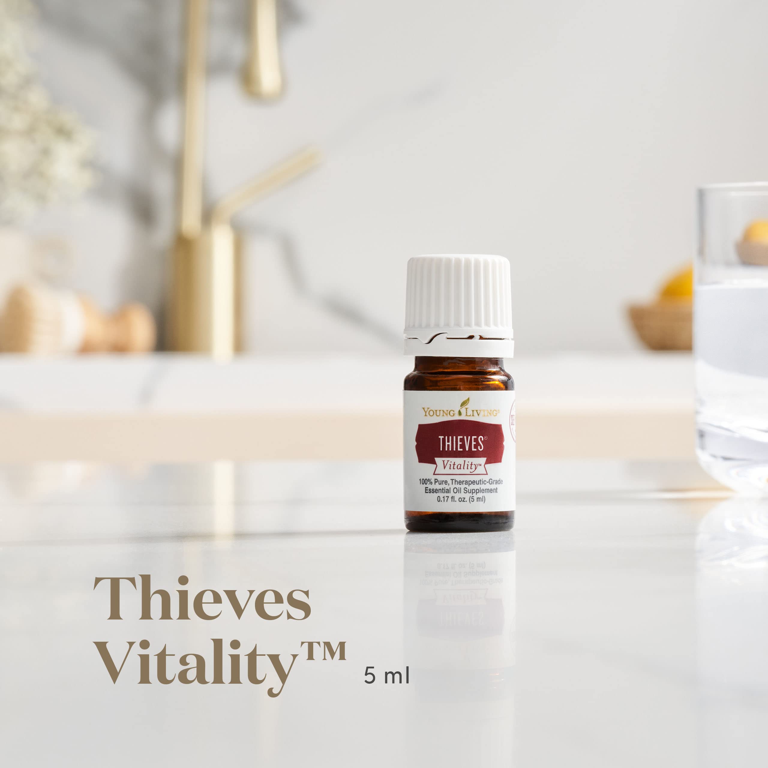 Young Living Thieves Vitality topical-application ready for easy skin-care use.