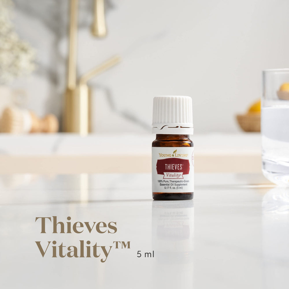 Young Living Thieves Vitality topical-application ready for easy skin-care use.