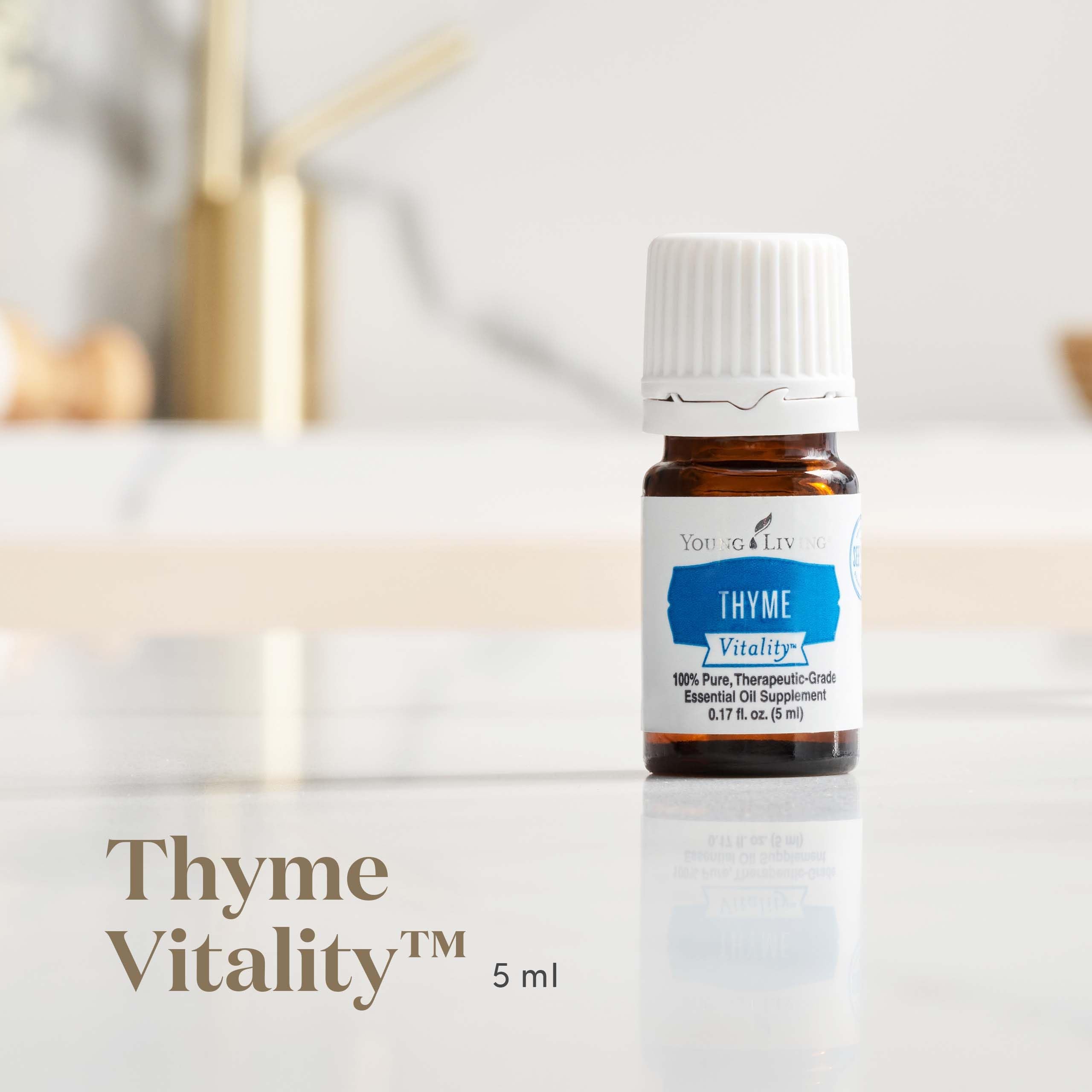 Young Living Thyme Vitality 5ml bottle closeup, pure flavor for savory dishes.
