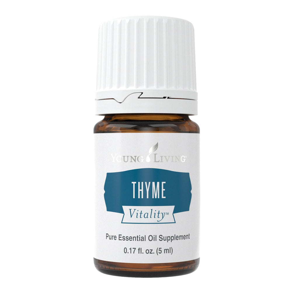 Young Living Thyme Vitality 5ml bottle pour, unleashing bold culinary flavor.