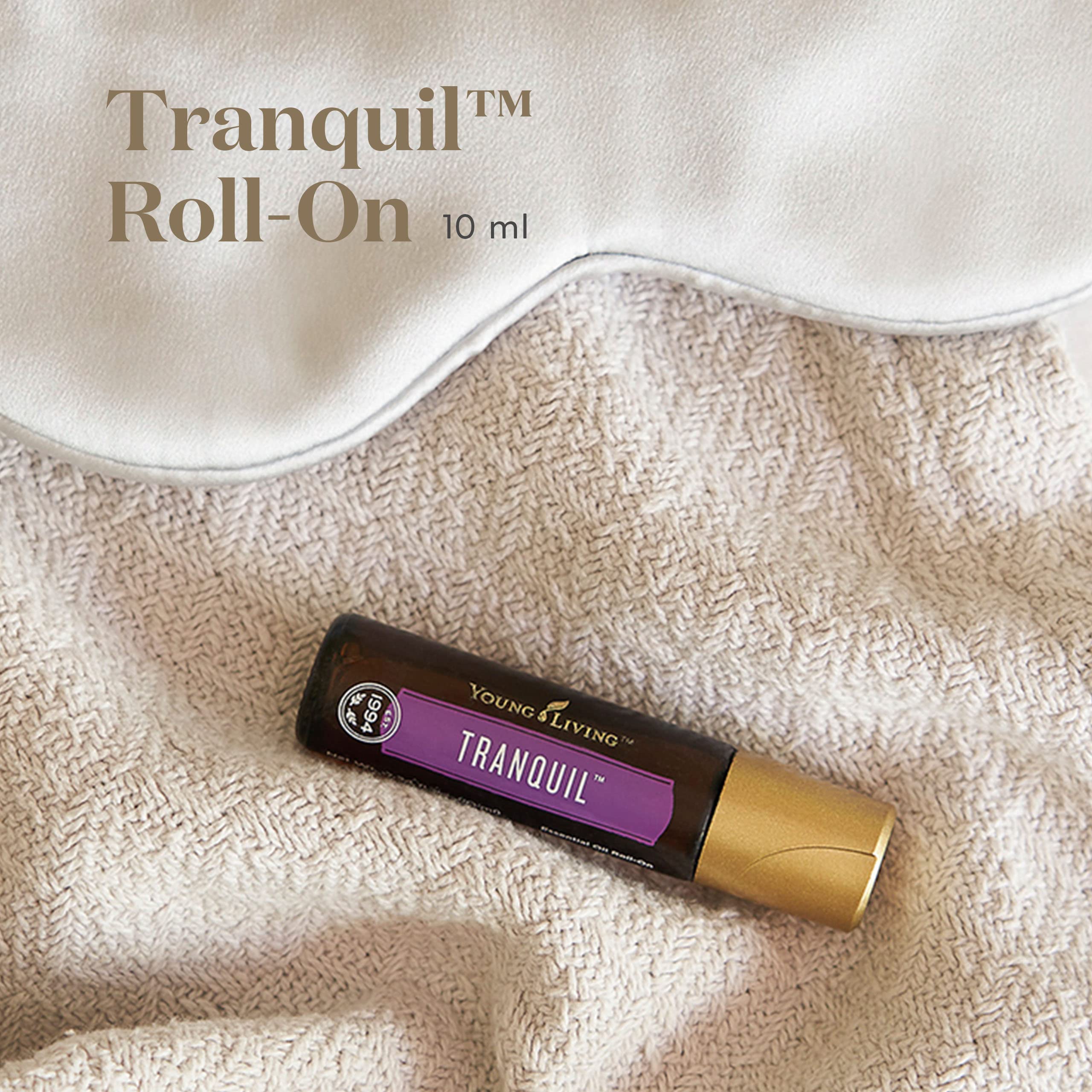 Young Living Tranquil roll-on cap visible, ideal for on-the-go relaxation.