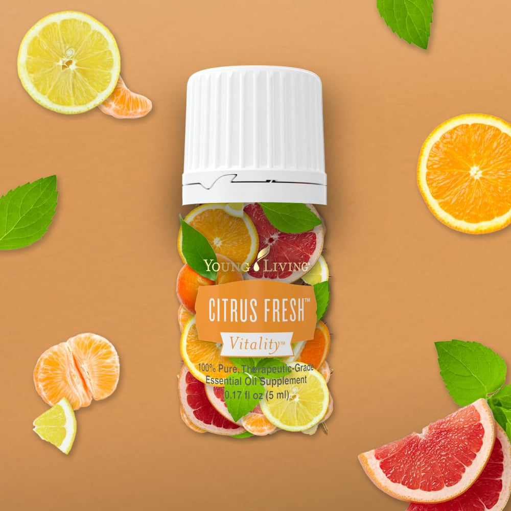 Young Living Vitality Citrus Fresh bottle closeup shows zestful aroma for flavoring beverages.