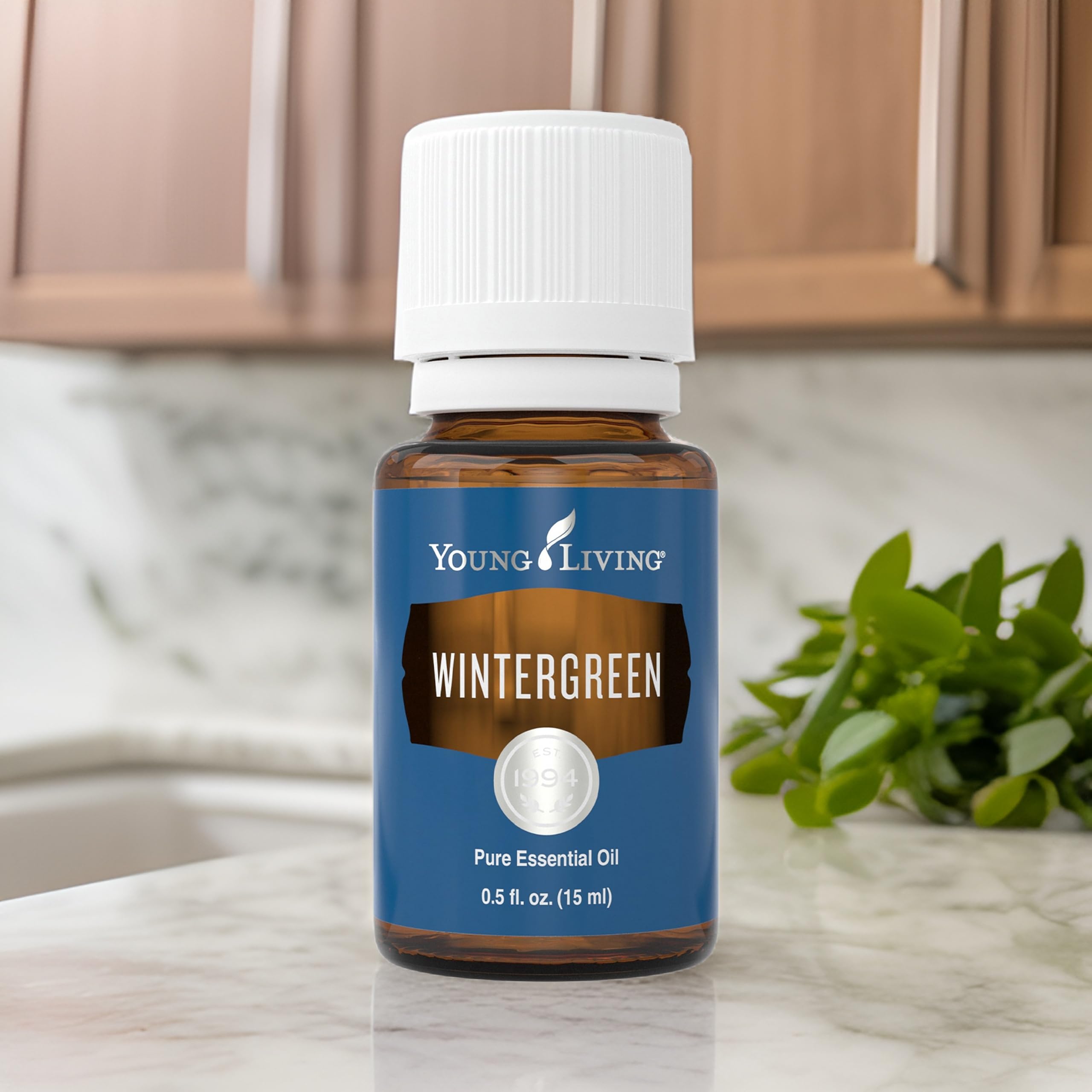 Young Living Wintergreen label detail, highlighting premium purity and brand quality.