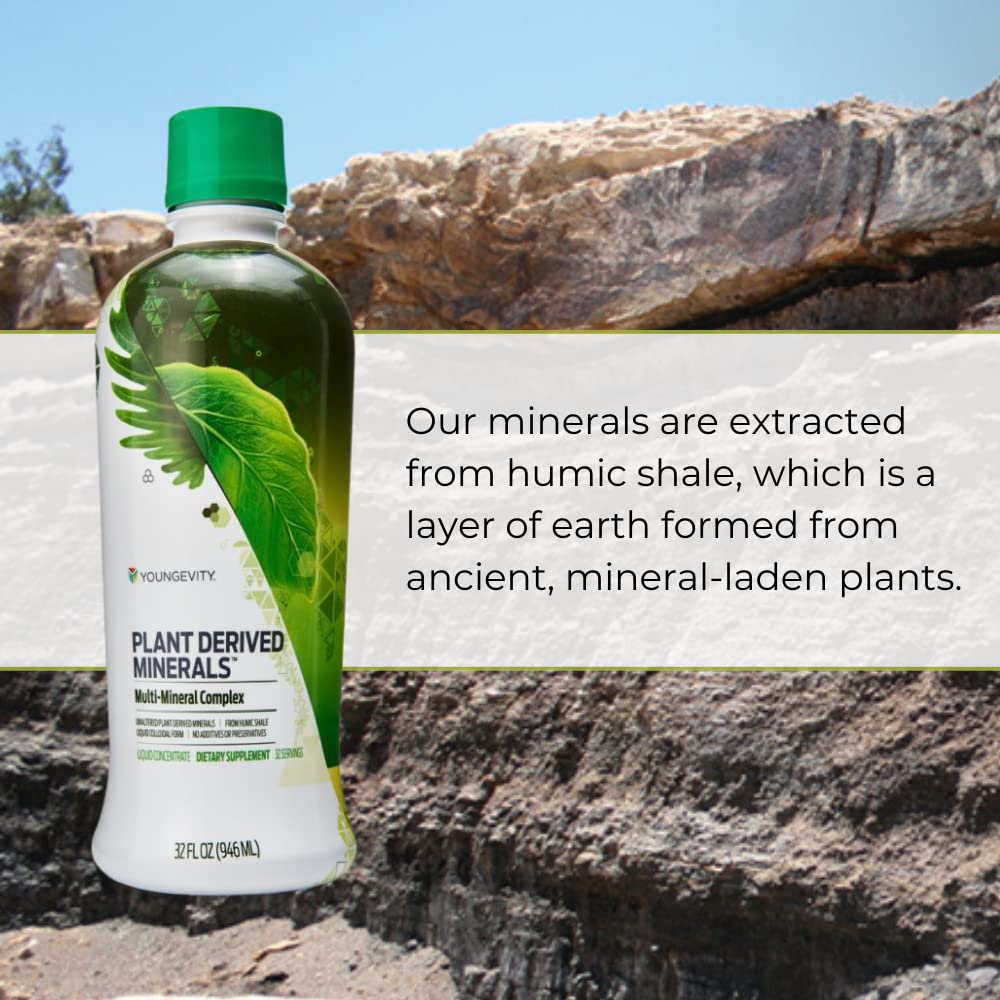 Youngevity Plant Derived Liquid Minerals being poured into a glass for easy use.
