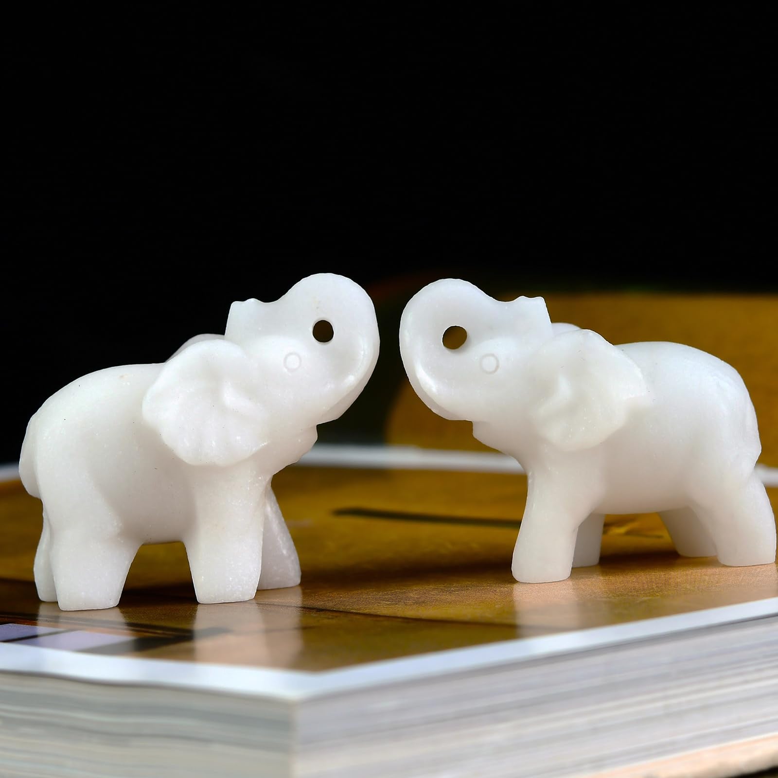 Ytbeoxk white jade elephant on a desk setup for natural decor and focus.