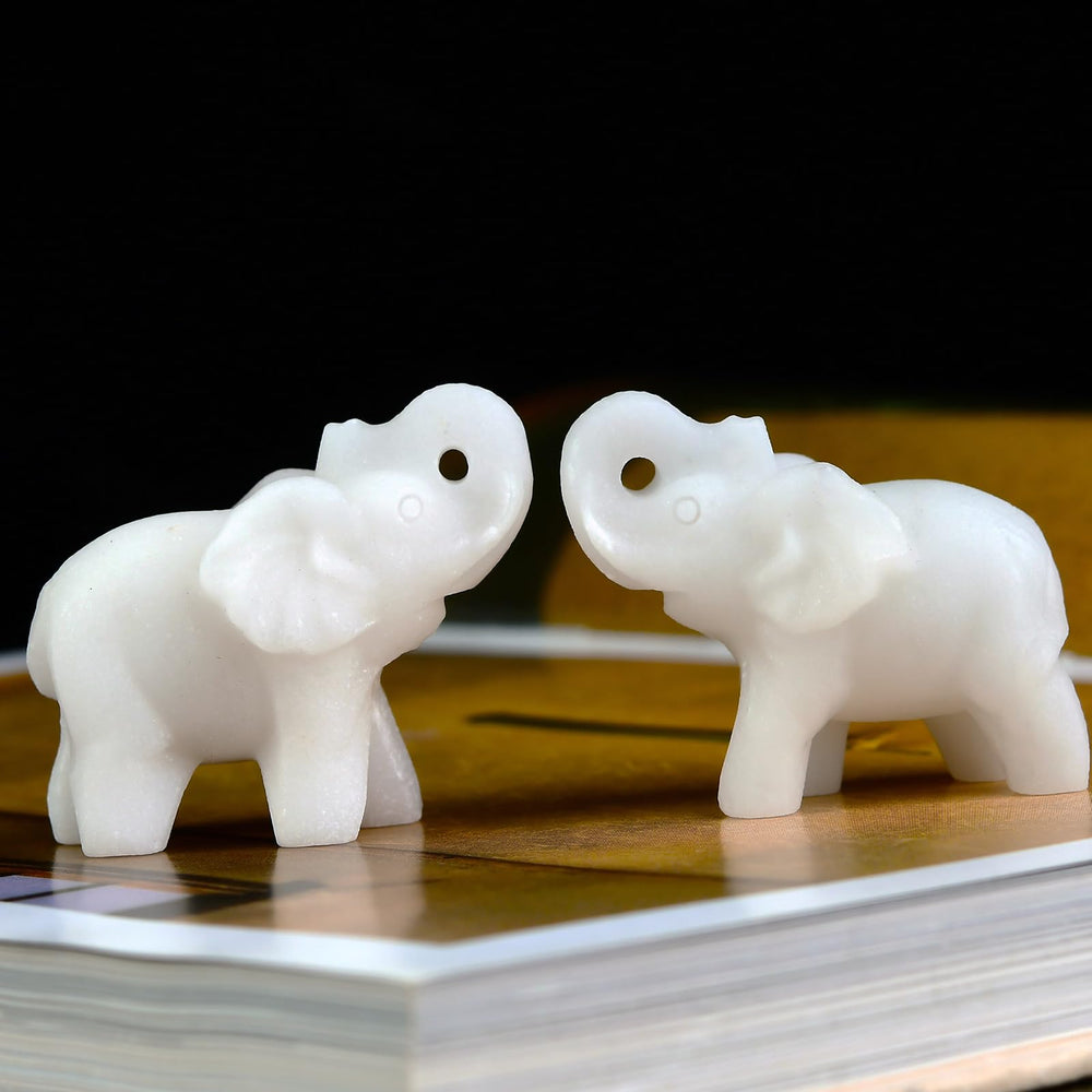 Ytbeoxk white jade elephant on a desk setup for natural decor and focus.