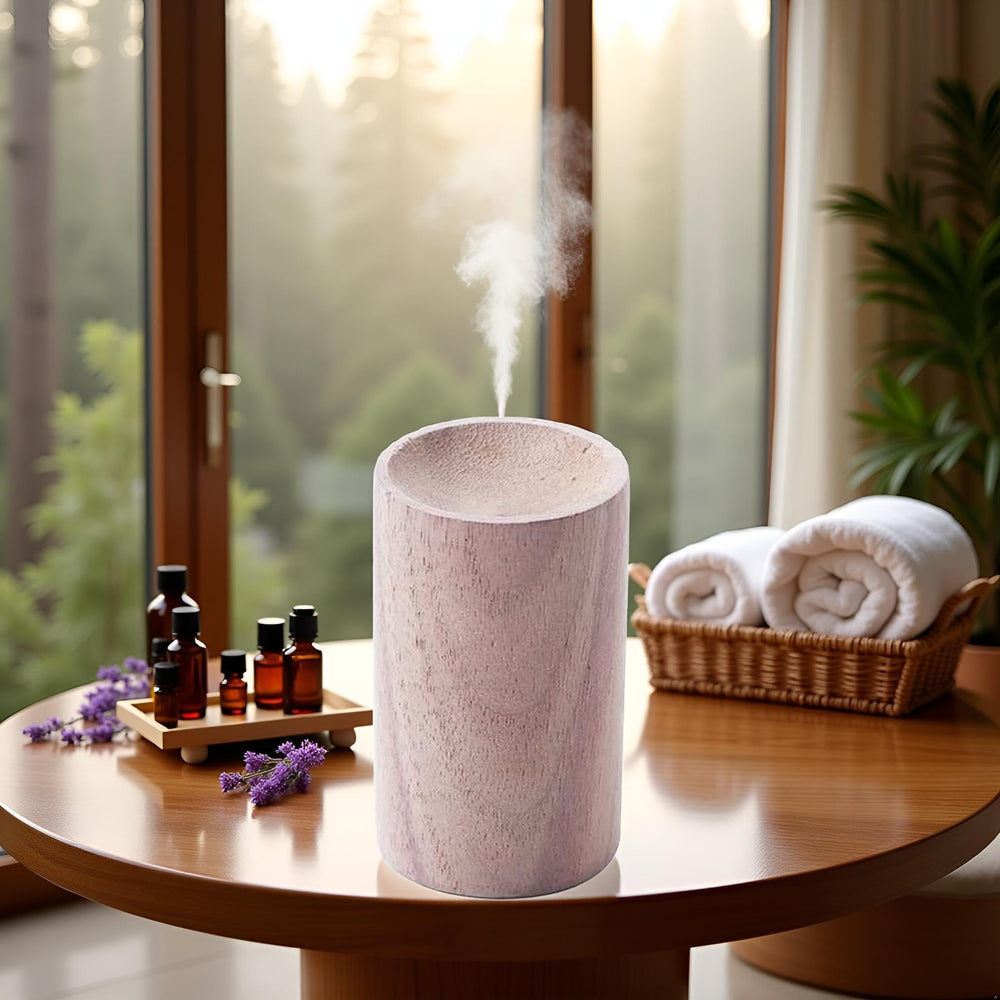 YuanHolumid desktop setup shows diffuser ready for essential oils.
