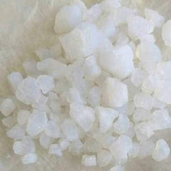 Yuktha Banslochan texture closeup showing fine granules ready for dissolving in drinks.