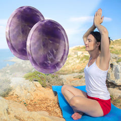 Yuntop thumb worry stone in hand with ergonomic groove for calming rub.