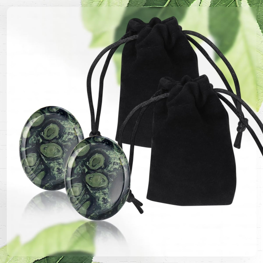 Yuntop Kambaba Jasper thumb worry stone in hand, a portable relaxation companion.