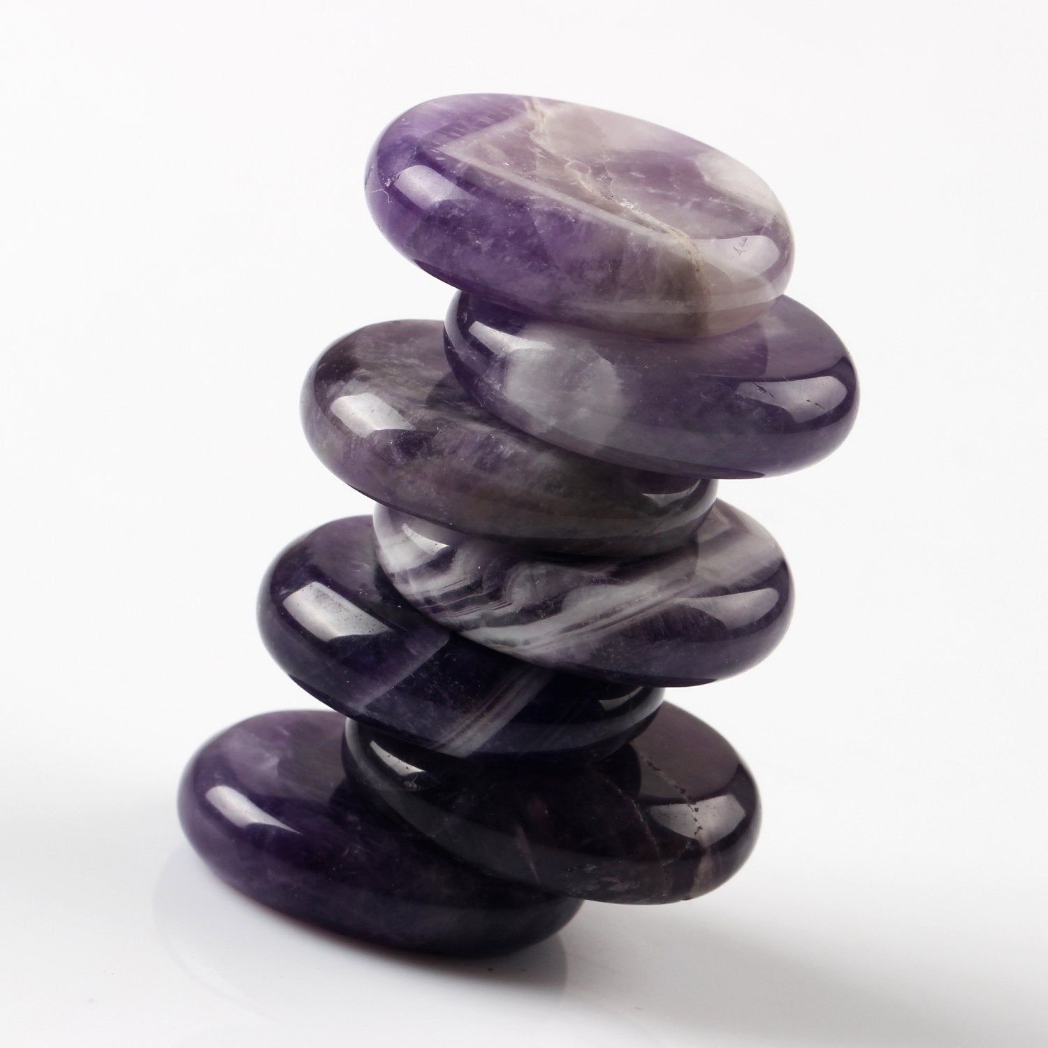 YWG Stone Amethyst palm stone in hand for tactile mindfulness