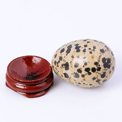 YWG Stone Dalmatian Jasper egg closeup showing polished surface for meditation