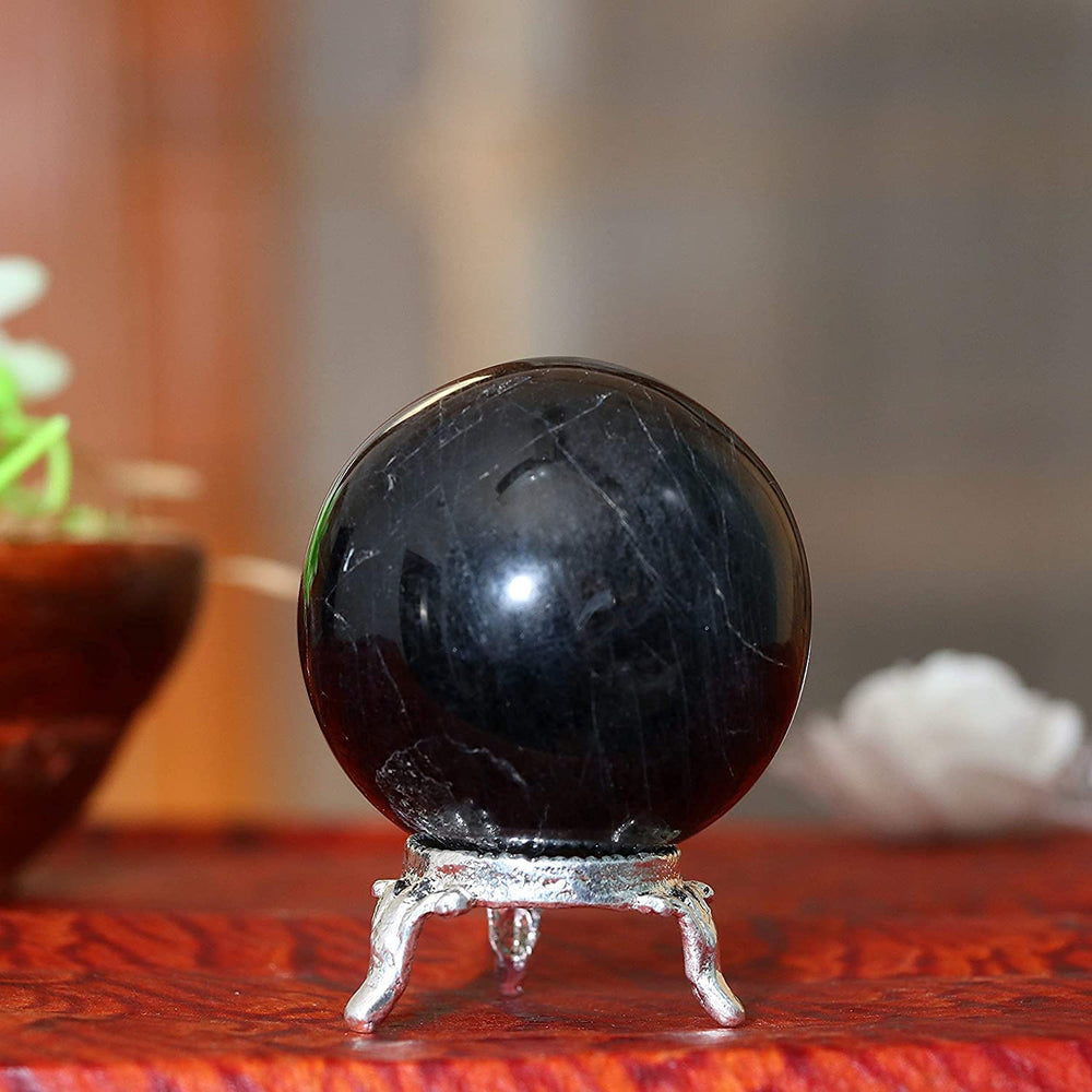 ZAICUS black obsidian crystal ball adds decorative energy to shelves.